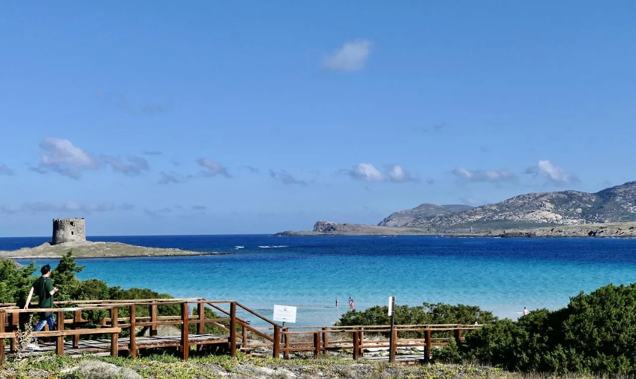 Resort Con Piscina A Soli 250 Mt Dalla Spiaggia La Pelosa Stintino Apartamento